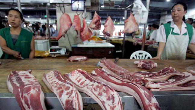 十一后 中国猪肉价格同比下跌近四成 十一后 中国猪肉价格同比下跌近四成
