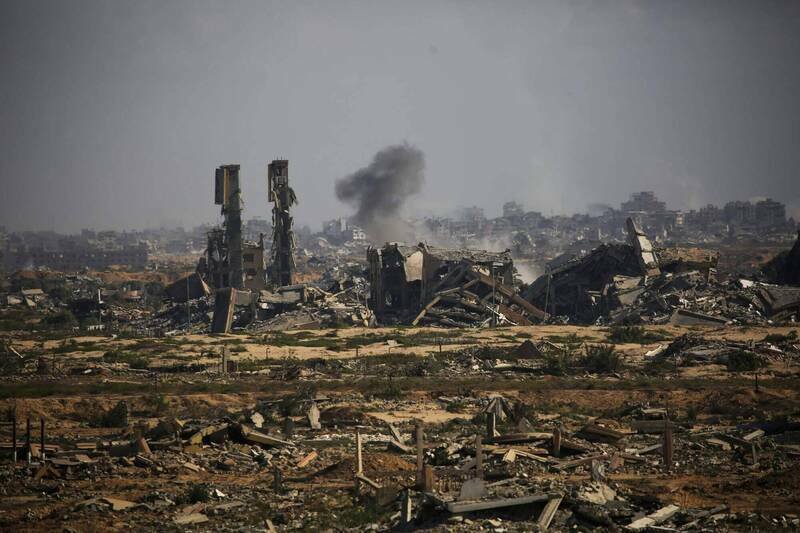 以色列与巴勒斯坦达成停火协议，以色列、哈玛斯13日分别释放人质、囚犯。图为加萨市。（法新社档案照）