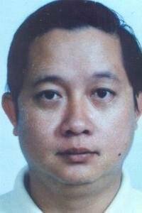 前台湾银行松江分行襄理陈守朴。（图撷取自调查局外逃通缉犯查询系统）