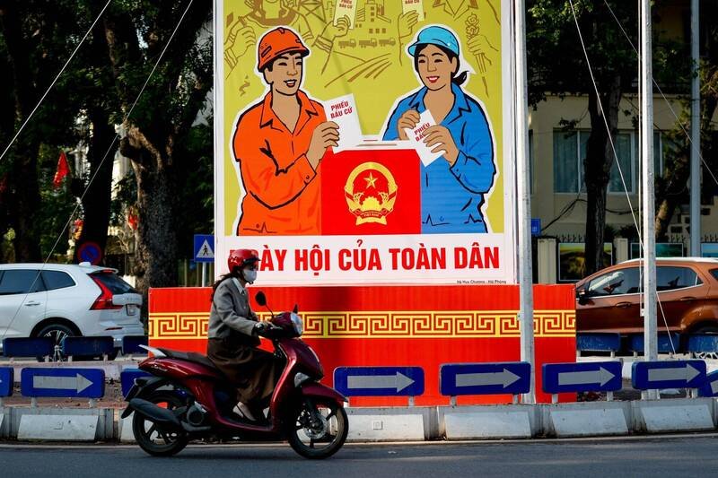 越南15日将举行5年一度选举，图为河内街头一处宣传看板。（欧新社）